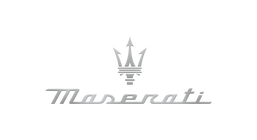 Silver Maserati logo with the trident emblem and script wordmark